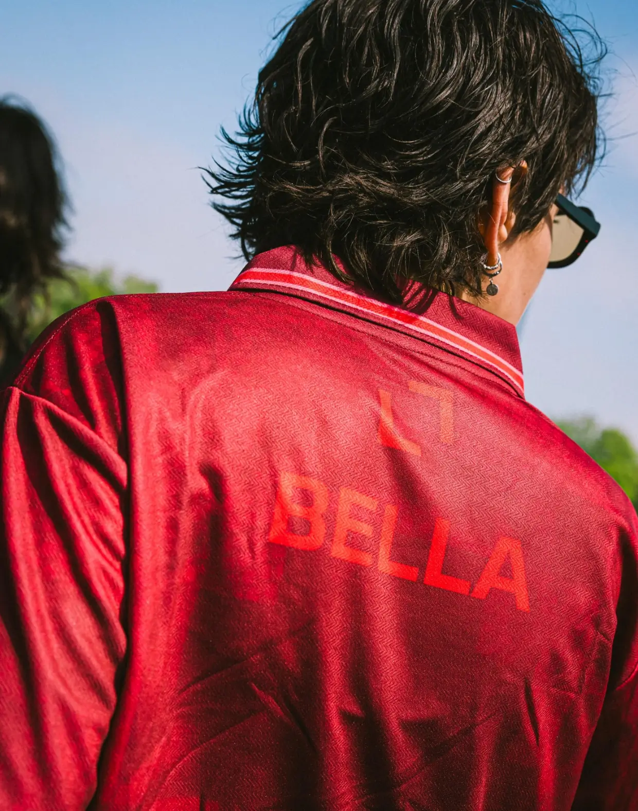 Artists wearing a Belanesia jersey at Loveland