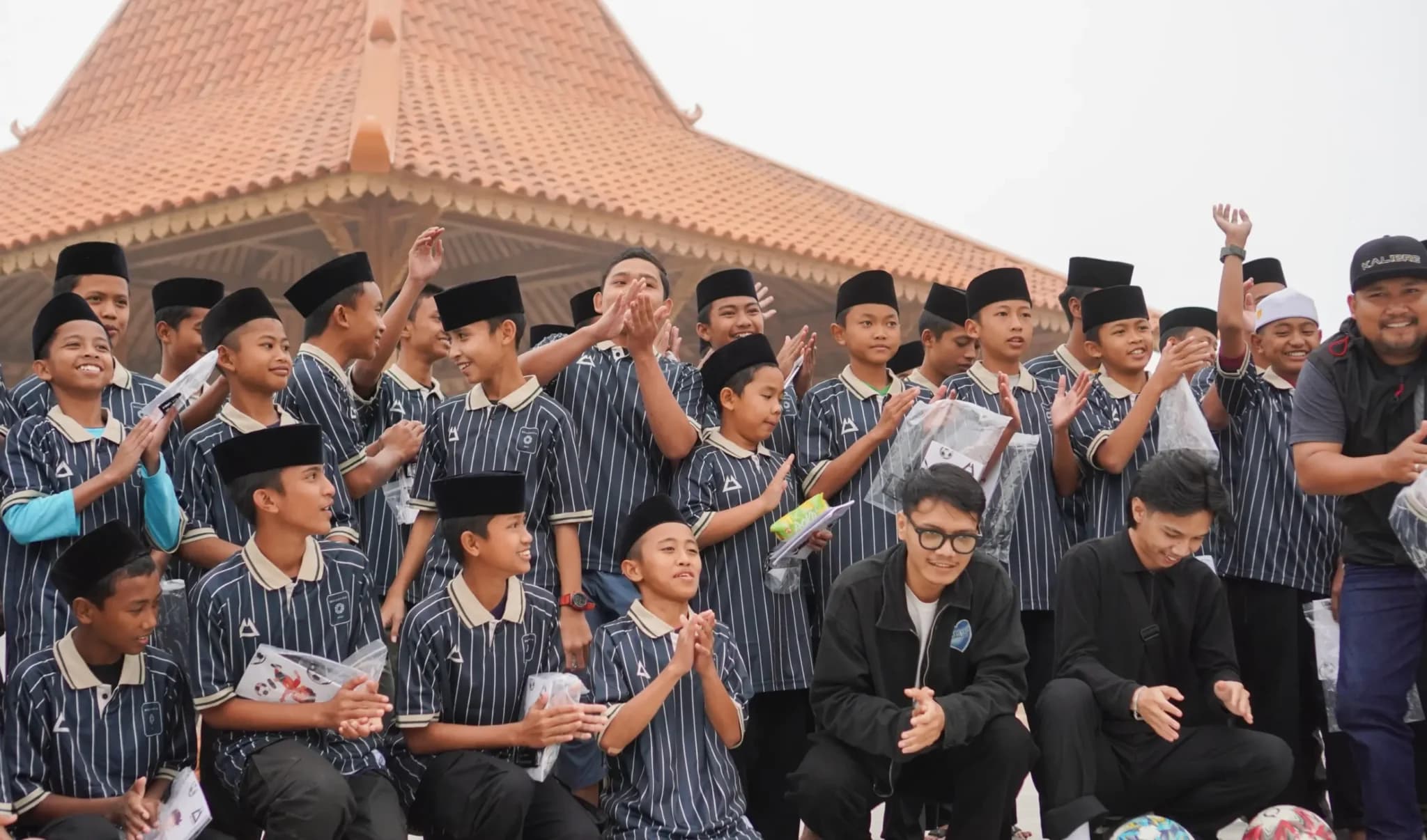 Belanesia hands out shirts in Indonesia